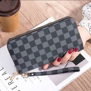 Beautiful long wallets with wrist strap.(brand new)